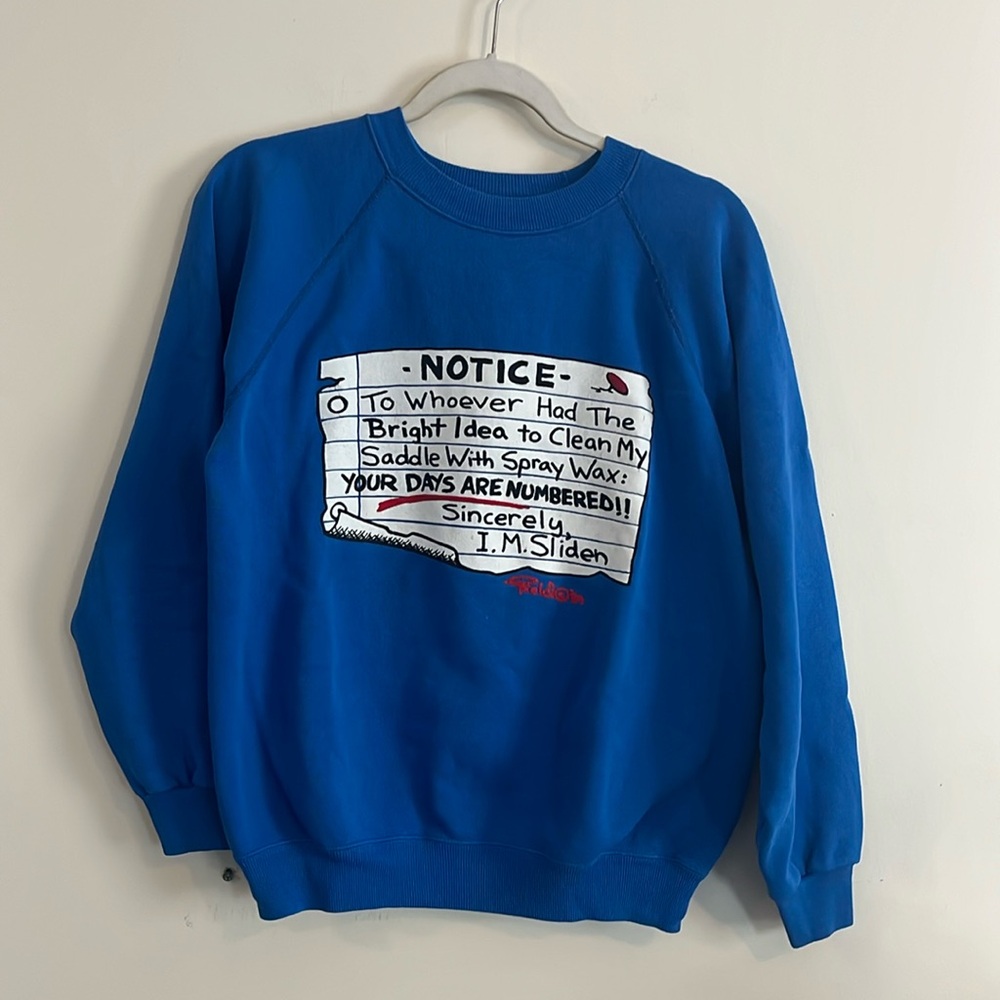 Vintage Blue Graphic Sweatshirt with White and Red Print